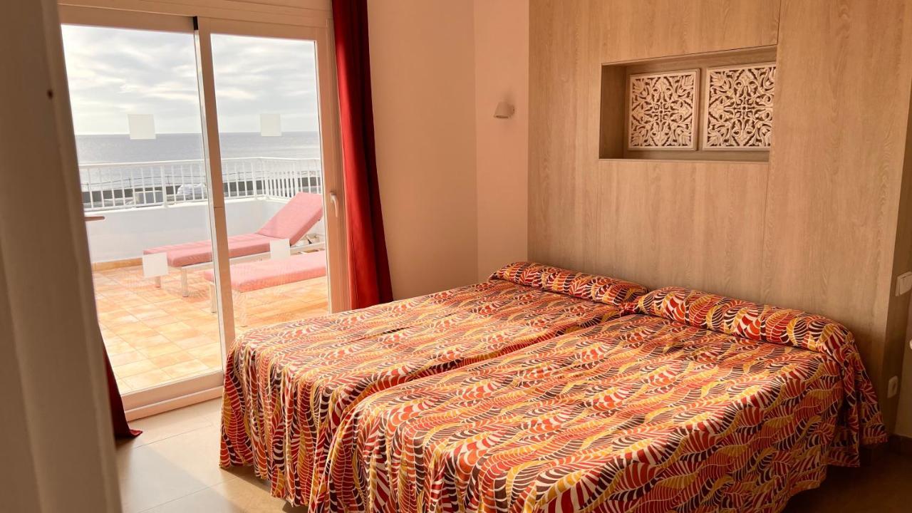 Aparthotel Boutique Poniente Playa San Antonio  Buitenkant foto